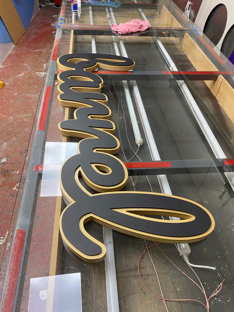 Wet sprayed PVC letter spelling "Barrel" for supermarket in London kalay creative