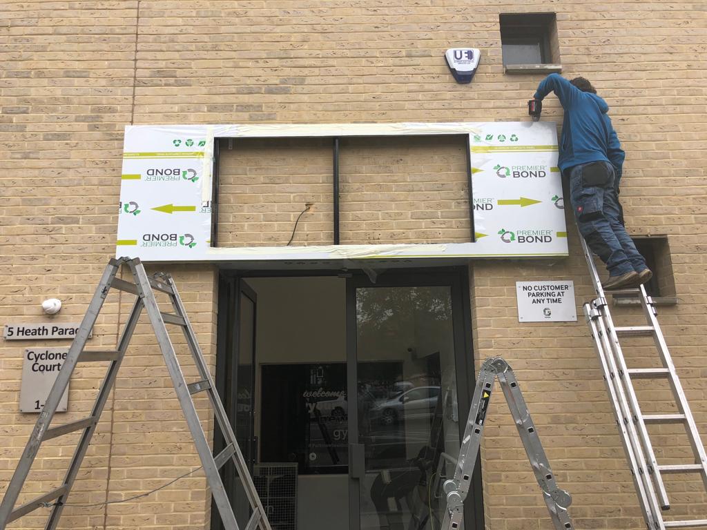 Sign installation for gym in London kalay creative