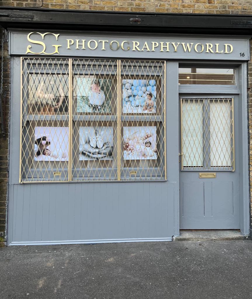 Gold Rimex stand off letters for photography shop in London kalay creative sign company